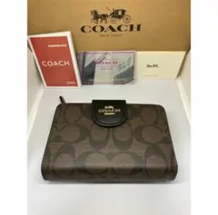 COACH　コーチ　C0082　二つ折り財布　ラグジュアリー　ブラウン×ブラック