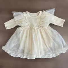 フリル付きクリーム色ワンピース