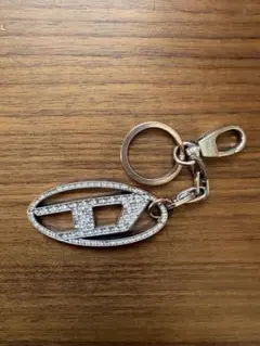 Diesel クリスタル装飾キーホルダー - メルカリ