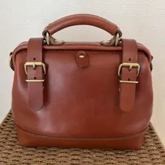 極美品 HERZ ヘルツ ルドミニョン ミニリュック レザー チョコ - メルカリ