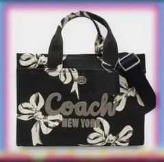 COACHコーチカーゴ トート26 リボン柄ボウ クロスボディ斜めがけ