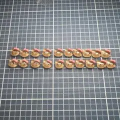 ネイルパーツ　日焼けキティ　顔ピンクリボン