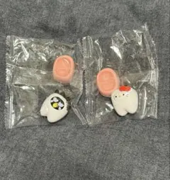 サンリオ みんなでなっちゃお！歯 ガチャガチャ　キティ　バツ丸