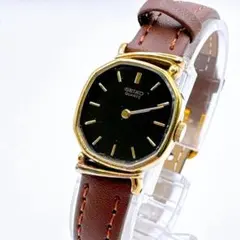 稼働品 SEIKO レディース 腕時計 クオーツ 黒文字盤 ゴールド 革ベルト