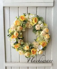 黄色のまるいお花のリース