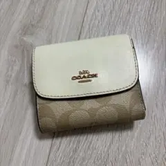 COACH 三つ折り財布 シグネチャー ベージュのサムネイル
