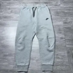 美品 NIKE ナイキ スウェットジョガーパンツ ロゴ テック S tech
