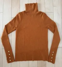 ディスコート　リブ袖口ボタンタートル