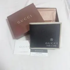 【値下げ中！！】GUCCI 黒 二つ折り財布のサムネイル