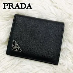 極美✨プラダ 二つ折り財布 サフィアーノレザー ロゴ金具 ブラック 1ml225 楽天市場】プラダ 二つ折り財布 財布 サフィアーノレディース PRADA