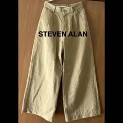 ベージュ チノパン