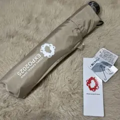 ミャクミャクロゴワンポイントEXPO2025 折りたたみ傘 ベージュ大阪関西万博