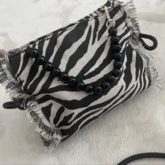 ゼブラ柄　フリンジ　クラッチバッグ