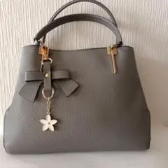 D.KELLY リボンチャーム付きグレー2wayバッグ
