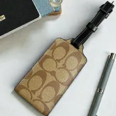 【新品】COACH コーチ　ネームタグ　ブラウン　旅行　ラゲッジ　シグネチャー