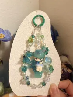 DIMOO青緑色のキャラクター付きストラップ