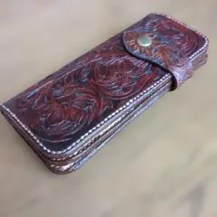 カ−ビング、エンボス加工ダークブラウン長財布新品訳あり