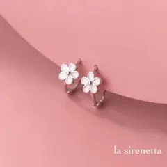 white flower hoop pierce
