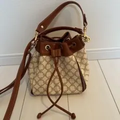 3月6日までの価格　ロゴ入り巾着バッグ ベージュ×ブラウン