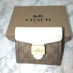 新品・未使用】COACH二つ折り財布ブラウン／ホワイト C7805 - メルカリ