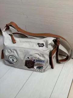 Dakota ショルダーバッグ キャンバス　レザー　ワッペン付