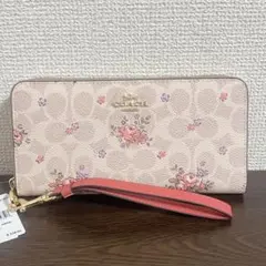 コーチ　 長財布　ベージュ　ストラップ付　花柄　シグネチャー　ラウンドファスナー