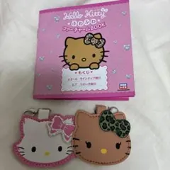 ハローキティ ふわふわファーチャーム　ヒョウ柄リボン　チャーミーキティ　ファー無