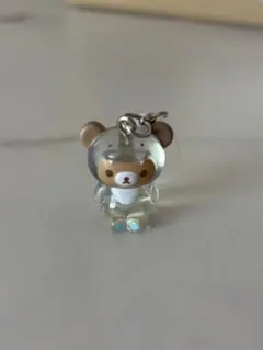 リラックマ　きょうりゅう着ぐるみフィギュア　めじるしアクセサリー　恐竜