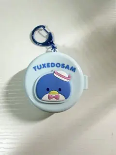 タキシードサム クシ