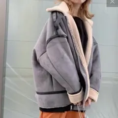 【who's who gallery】フェイクムートンジャケット グレー