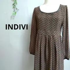 インディヴィ ワンピース シースルースリーブ ひざ丈 幾何学模様