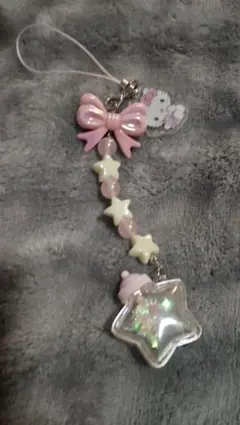 サンリオ　シークレットストラップ　星屑ベイビーボトル キティ