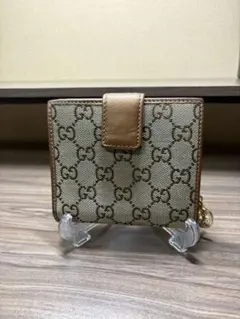 GUCCI GGキャンバス 二つ折財布 ロゴプレート アイボリー コンパクト