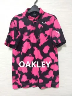 OAKLEY 半袖ポロシャツ ピンク ブラック 総柄のサムネイル