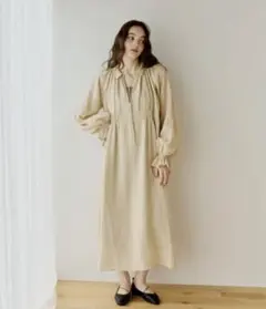 ollun』stripe tiered one-piece / cream - メルカリ