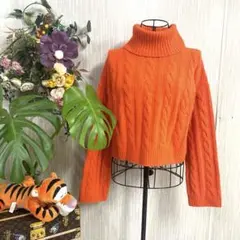 GU 　オレンジ ケーブル編み タートルネックセーター レディース　S