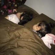 K.