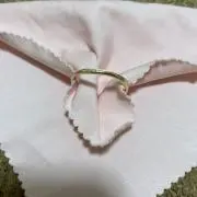 にし