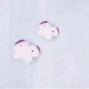 ま