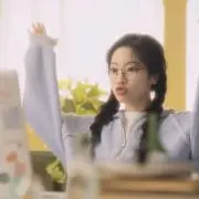 T K