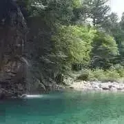 by@